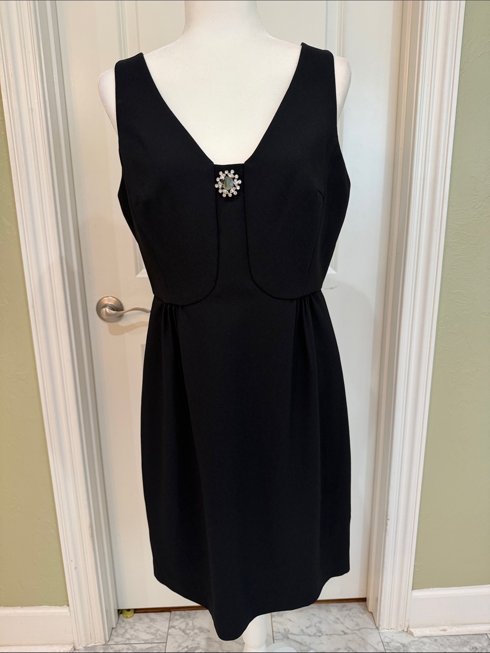 Trina Turk Black Sleeveless V-Neck Dress with Brooch Detail